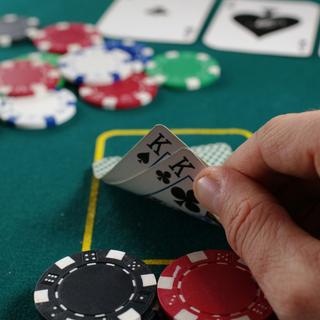 Person holding cards