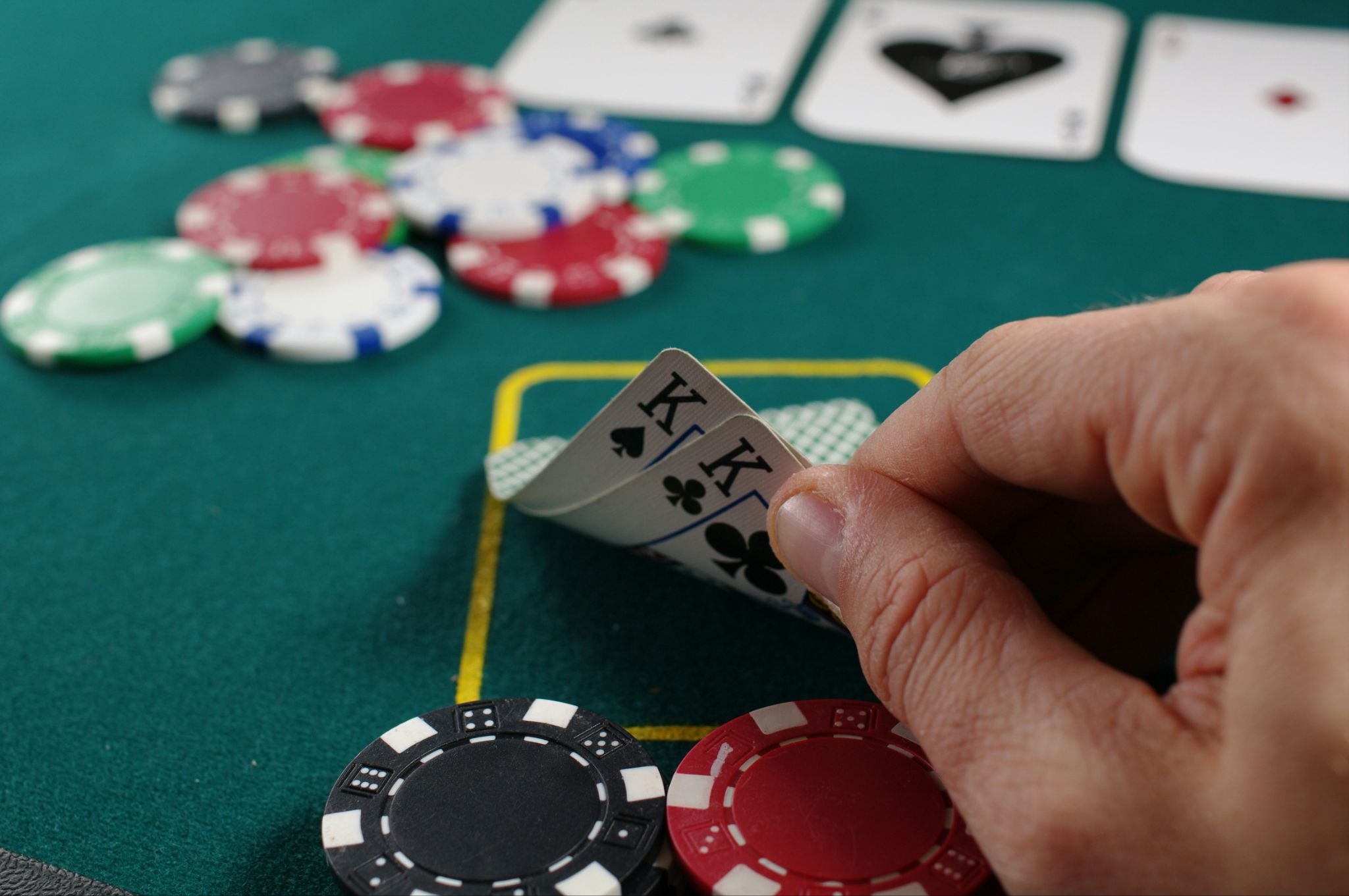 Person holding cards